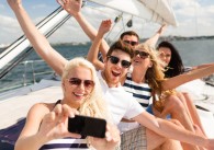 Young people on a boat having fun