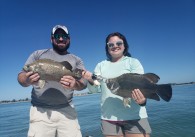 Father and daughter with tripletail in Florida - Catch Memories Boatsetter Fishing Giveaway