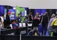 Booths and attendees at the Fly Fishing Show in Denver